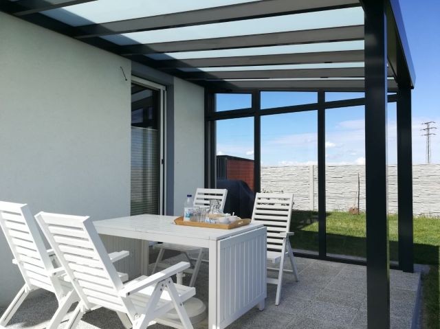 Jak sladit pergolu s fasádou domu